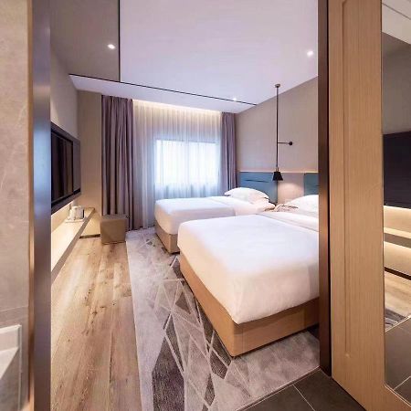 Chaoman Hotel -Guangzhou Shijing City Plaza Xiaoping Subway Station المظهر الخارجي الصورة