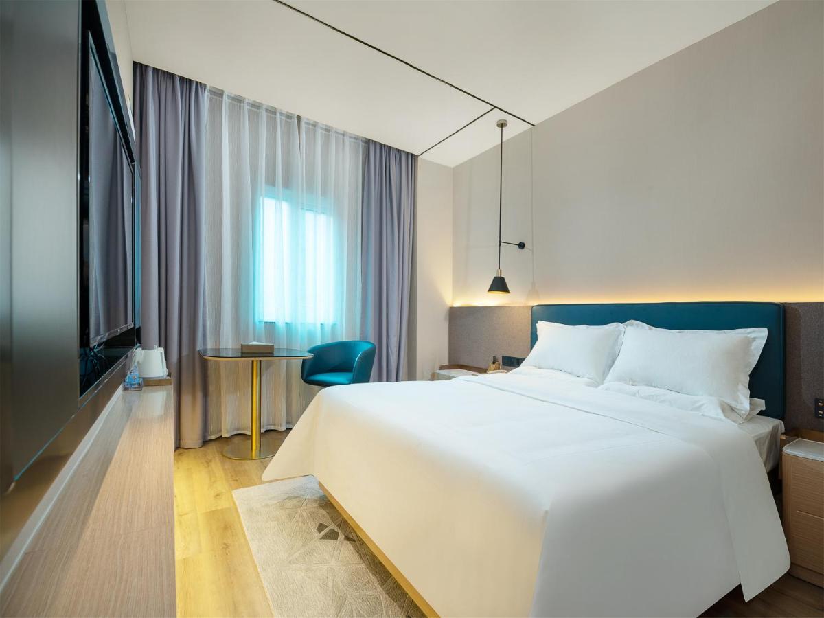 Chaoman Hotel -Guangzhou Shijing City Plaza Xiaoping Subway Station المظهر الخارجي الصورة