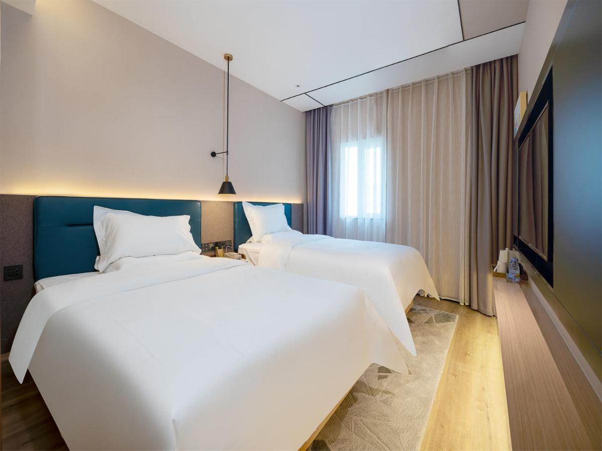 Chaoman Hotel -Guangzhou Shijing City Plaza Xiaoping Subway Station المظهر الخارجي الصورة
