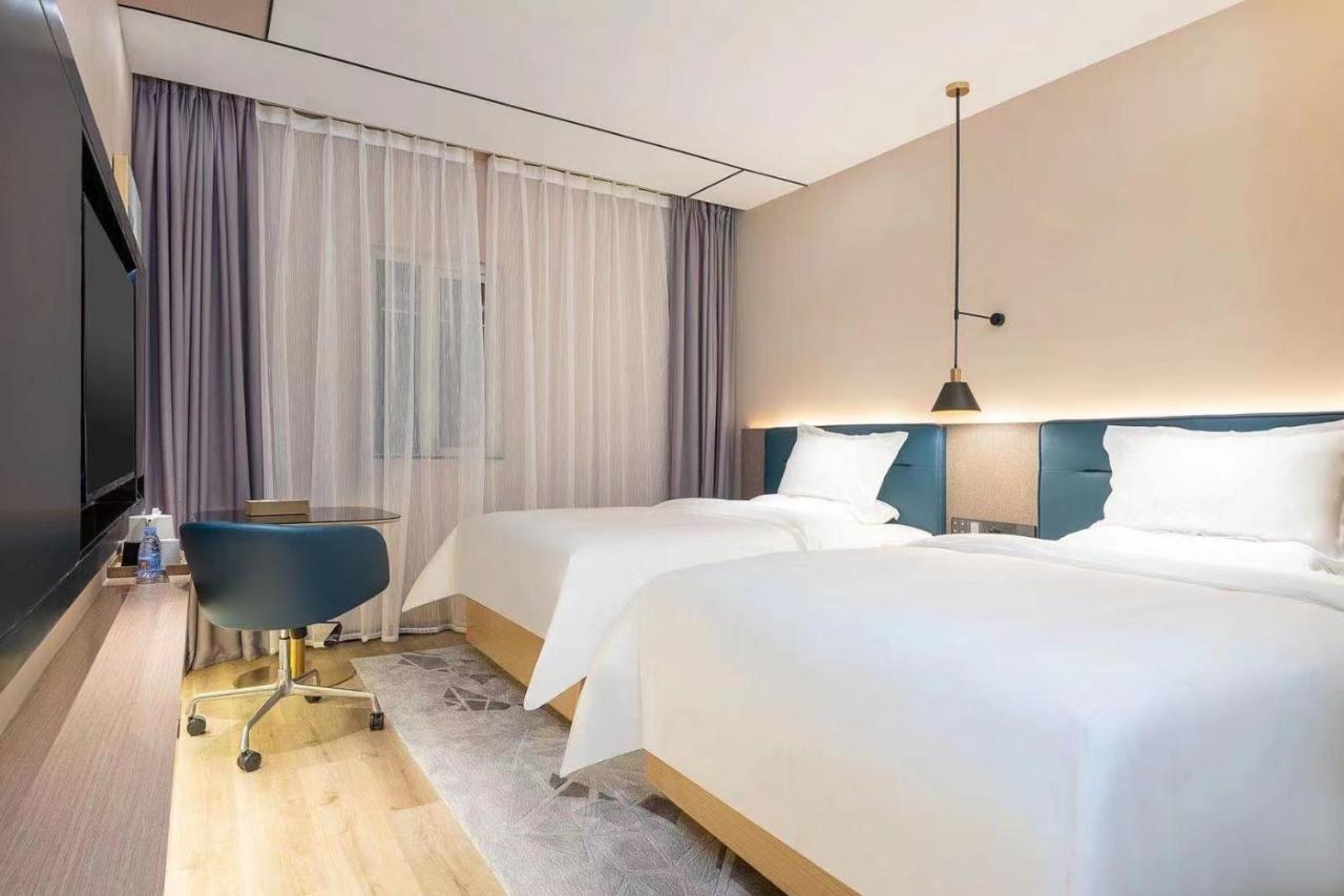 Chaoman Hotel -Guangzhou Shijing City Plaza Xiaoping Subway Station المظهر الخارجي الصورة